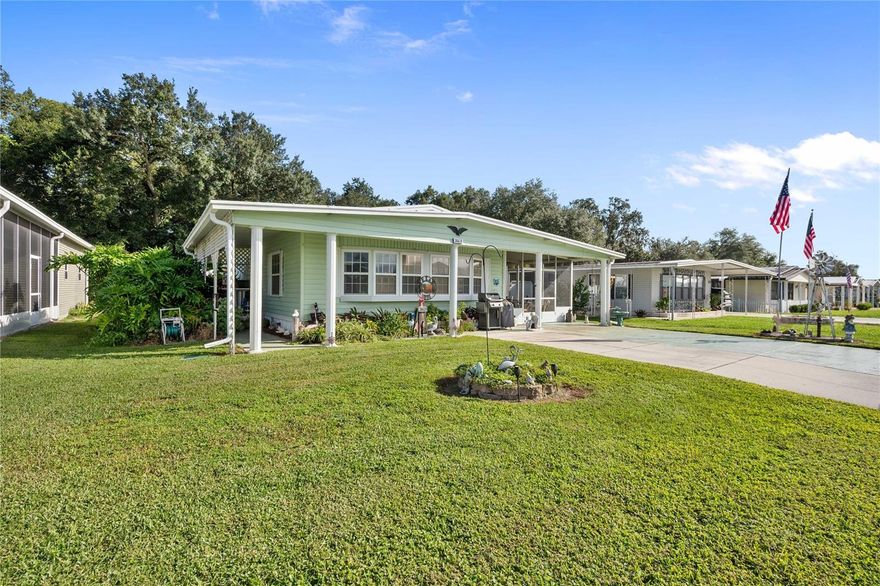 Welcome to your Florida retreat! This charming 2BR/2BA home is located in an active 55+ golf community where you own the land and enjoy a low annual fee of just $435. Nestled on a quiet street, this pet-friendly property with fenced backyard is ideal for both seasonal escapes and full-time living. A double driveway provides plenty of parking for friends, family, or even your golf cart. Relax in the front screen room as you take in the warm Florida breezes, or step through the double French doors into the bright Florida room, thoughtfully added to the central AC system for year-round enjoyment. Inside, you’ll appreciate the open concept layout between the dining area and living room, perfect for entertaining or simply relaxing. A bonus room just off the kitchen makes an excellent office, hobby room, or casual dining space. From the living room, step onto the additional open porch to enjoy the sunshine. The Spacious Owner’s Retreat is large enough for a king-sized bed, complete with ceiling fan, walk-in closet, and en-suite bath featuring an updated vanity and step-in shower. The second bedroom easily accommodates a queen-sized bed and offers a built-in closet and ceiling fan for comfort. A convenient guest bath is nearby. You’ll love the indoor laundry area with extra storage, as well as the many detached backyard buildings that add incredible value—perfect for golf cart parking, a workshop, or extra storage. Enjoy an active Florida lifestyle with access to community amenities, neighborhood activities, and the freedom to bring your furry companion along. Whether you’re hosting a card game, working on a project in your workshop, or simply relaxing on the porch, this home offers everything you need for comfortable and enjoyable living. Betmar Acres is renowned for its exceptional amenities, including 27 holes of golf, two swimming pools, two hot tubs, three clubhouses, scenic walking trails, a library, and game rooms with billiards, table tennis, and board games. The community also offers miniature golf, enclosed shuffleboard courts, tennis and pickleball courts, bocce, basketball, and weekly bingo—ensuring endless opportunities for fun, fitness, and social connection. This home offers the perfect balance of comfort, style, and active living in one of Florida’s most sought-after 55+ communities. Don’t miss your chance—schedule your private showing today and start living the lifestyle you deserve!