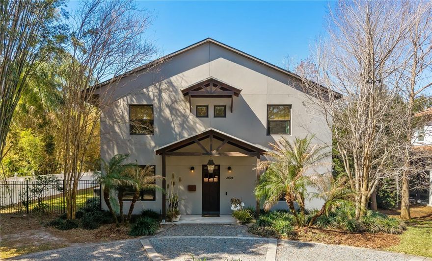 A masterfully crafted custom residence in the heart of Winter Park, this 2014 Barefoot Brothers home blends timeless architecture with modern functionality just moments from Park Avenue and the Audubon Park Garden District. Designed for both refined entertaining and active everyday living, this 5-bedroom + office home offers a flexible, family-focused floor plan plus an expansive second floor bonus room, ideal for recreation, media, or study. A formal dining room and oversized great room with 11.5’ ceilings create the perfect balance of comfort and sophistication. The first-floor primary suite features a private, attached office space and a spa-inspired ensuite with marble floors, marble-topped double vanity, freestanding cast iron soaking tub with gooseneck filler, double walk-in shower, Kohler fixtures, and a statement chandelier over the tub.

The chef’s kitchen showcases marble countertops, a walnut center island, a large walk-in pantry, 10’ ceilings, GE gas range, new Samsung refrigerator, and Bosch dishwasher — all opening seamlessly to the living area anchored by a gas fireplace with custom built-ins and double French doors leading outside.

Designed with connection in mind, the breezeway links the main home to the detached garage and opens to a charming river rock paved patio — perfect for gatherings and outdoor dining. A recently repainted timber-framed front porch welcomes guests with timeless curb appeal, complemented by a circular driveway, irrigation system, and landscape lighting.

Built with longevity and energy efficiency in mind, this home features insulated concrete form (ICF) construction, vinyl double-pane Low-E windows, two tankless water heaters, natural gas connections (fireplace, range, dryer, outdoor grill), Cat 6 ethernet wiring, surround sound, and ceiling fans throughout.

Spend your mornings biking to coffee on Park Avenue and your evenings enjoying dinner in the Audubon Park Garden District — all while coming home to a thoughtfully constructed retreat designed for modern family living. With roof, electrical, and plumbing completed in 2013, this home offers peace of mind, architectural character, and an exceptional lifestyle in one of Winter Park’s most desirable corridors. Schedule your private showing today!