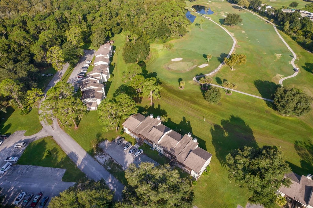 Photo of 20104 Sandalwood Drive #104, Wildwood, FL 34785 (MLS # O6449365)