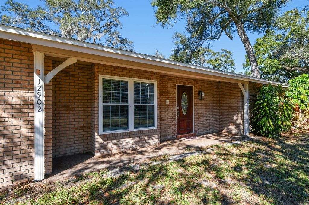 Photo of 12902 N Howard Avenue, Tampa, FL 33612 (MLS # TB8457465)