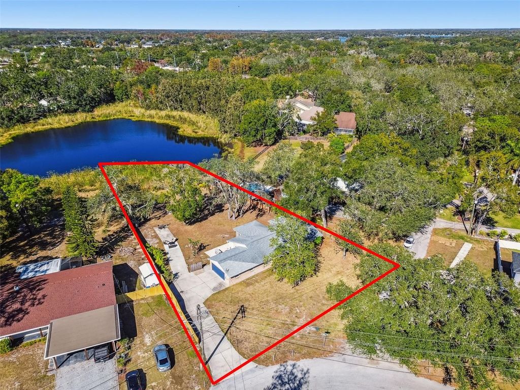 Photo of 12902 N Howard Avenue, Tampa, FL 33612 (MLS # TB8457465)