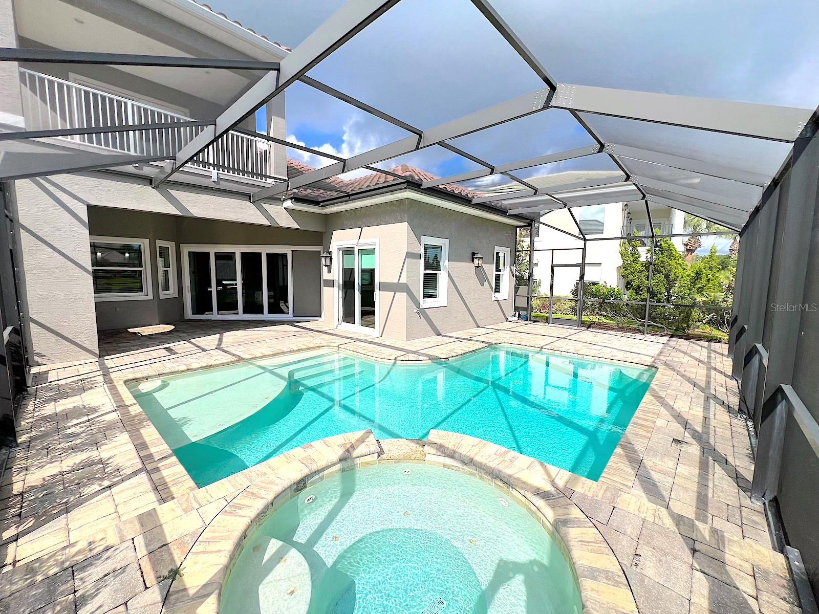 Built by Bellagio Custom Homes this fantastic 3 bedroom, 1 office, 3.5 bathroom, 2 car finished garage home features LAKE and OCEAN views and is a short walk from the beach! The ultra luxury home offers tons of upgrades like tray ceilings, porcelain wood-look tile and a gourmet kitchen with custom cabinets, accented by a glass tile backsplash, and beautiful quartz countertops. Other upgrades include Kohler enamel sink and stainless appliances, including a gas range and electric wall oven. The kitchen opens to the great room which is anchored by a gorgeous tiled electric fireplace. Each bedroom features its own bathroom access. The second floor offers water views from a huge bonus room and balcony with a wet bar. The home comes with a gorgeous screened pool and spa, as well as a large summer kitchen w Grill and stunning WATER VIEW! This house is located in the exclusive Hammock Beach gated community and is close to everything Palm Coast offers, including shopping, entertainment, schools, parks, and more. Easy access to major roadways and the I95 makes for easy commute to Jacksonville or Daytona Beach. LAWN CARE INCLUDED. Apply today! LBTR#13922