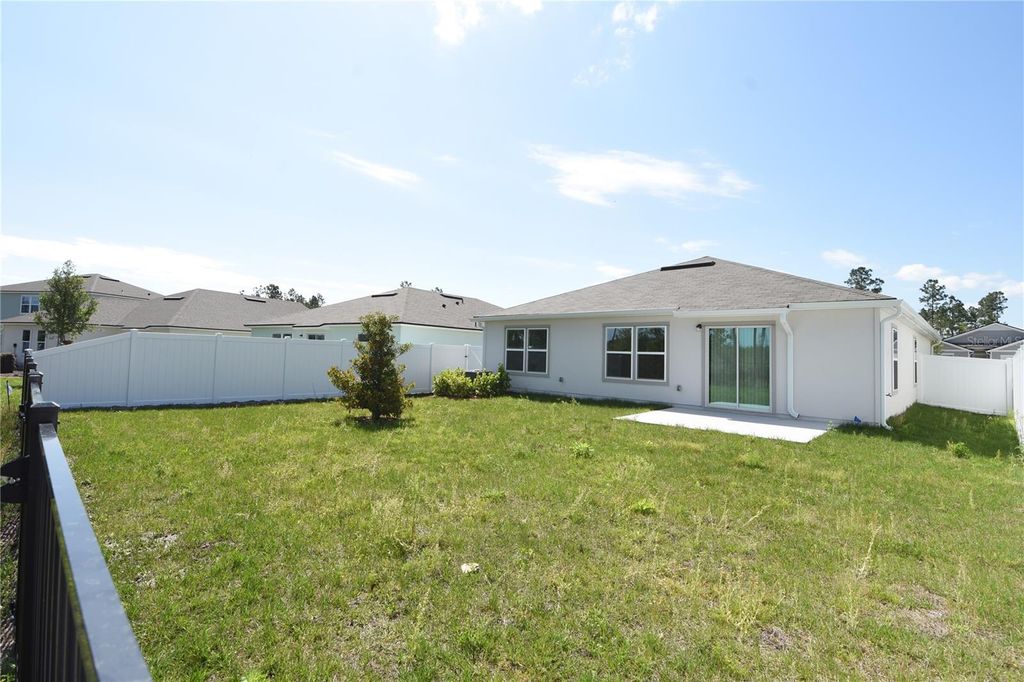 Photo of 9 Springwood Drive, Palm Coast, FL 32137 (MLS # FC318140)