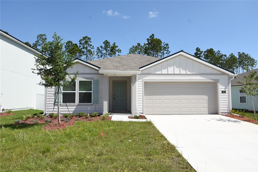 Photo of 9 Springwood Drive, Palm Coast, FL 32137 (MLS # FC318140)