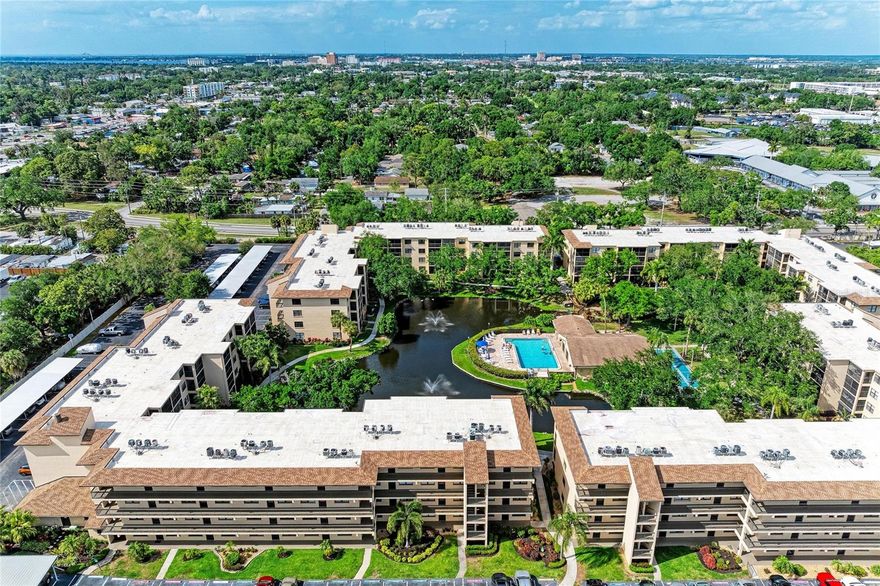 Partially furnished 2-Bedroom Condo with Water View!! Look no further for your seasonal retreat or year-round oasis at Woodpark. This beautifully updated cozy condo invites you to start living the Florida lifestyle you’ve always dreamed of living. Conveniently located outside downtown Bradenton, this 2nd floor (elevator accessible) 2-bedroom, 2-bath unit boasts a water view, a glimpse of the pool, and the option to include some furnishings for a seamless move-in experience. Step inside to an airy condo filled with natural light and a layout that maximizes comfort and convenience. The eat-in kitchen shines with trending grey cabinetry with under-cabinet lighting, tray ceiling accents with cove lighting, a classic stacked-tiled backsplash, granite countertops, and stainless steel appliances. The open-plan living and dining area creates a bright, welcoming atmosphere—ideal for entertaining or relaxing after a day in the sun. The main bedroom features its own en-suite bathroom with a spacious walk-in closet, all enhanced by a gazing water view. The guest bedroom is situated at the front of the condo, providing privacy for you and your visitors, with easy access to the second bath located in the same hallway. Enjoy your morning coffee on the cozy enclosed balcony. Open the sliders during fall to let the cool breeze fill your home, or use the roll-down sunshades to adjust the natural light for a relaxing ambiance any time of day. In-unit laundry room eliminates the hassle and extra cost of shared facilities. In addition to a new kitchen, you get new designer ceiling fans & lighting, bathroom updates with solid surface areas, framed mirrors, tray bath ceilings, neutral tile on diagonal in all of the wet areas and LVP flooring in the remaining living space along with tastefully painted interior walls. Easy access to both the elevator and stairs just steps from your door. You have your own storage closet on the same floor—perfect for beach chairs, fishing poles, and more. Assigned parking, conveniently located in front of the condo, and open guest parking available. Woodpark At Desoto Square offers a wealth of amenities for an active and social lifestyle, including temperature controlled (summer and winter) swimming pool, grilling and picnic area, game room and community clubhouse. Engage with your neighbors through regular social events such as game nights, bingo, street parties, and potluck dinners. The scenic pond and well-maintained grounds provide a picturesque setting for daily walks and relaxation. This is your opportunity to own a move-in ready condo in one of the area’s well-managed communities. Whether you’re seeking a 55+ seasonal escape or a year-round home with no special assessments, moderate condo fees, and well-maintained buildings and grounds, Woodpark At Desoto Square is ready to welcome you. Close to shopping, medical facilities, and downtown Bradenton’s Riverwalk with access to the new water taxi from downtown to the world-renowned beaches of Anna Maria Island. Don’t miss out—schedule your private showing and make this Florida paradise your own!