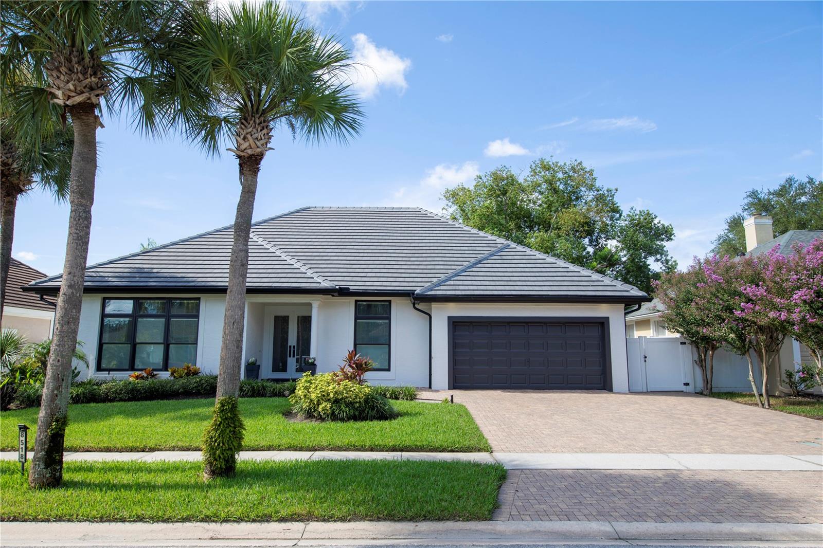 Step into this beautifully renovated 4-bedroom, 2-bathroom home, ideally located in a quiet small neighborhood in the coveted Winter Park school district. With a brand-new kitchen, updated bathrooms, wood flooring, an elegant wood-burning fireplace, and a sparkling pool, this home offers the perfect combination of modern luxury and timeless charm. As you enter, you’ll be immediately struck by the soaring 12-foot ceilings that create an open, airy atmosphere, filling the space with natural light. The brand-new kitchen is a chef’s dream, showcasing sleek modern finishes, high-end appliances, custom cabinetry, and expansive counter space. It seamlessly flows into the dining and living areas, making it perfect for both everyday living and entertaining. The spacious living room, featuring a cozy wood-burning fireplace, offers a perfect place to relax or host guests. Updated lighting throughout the home adds a fresh, contemporary touch, while the extra-high ceilings enhance the home’s sense of grandeur. A standout feature of this home is the HIDDEN ROOM, which was converted from the original fourth bedroom. Located just off the living room, this secret space is ideal as a private office, reading nook, or even a home theater—perfect for anyone seeking a little extra intrigue! The bathrooms have been recently updated to reflect modern design trends, with luxurious finishes and stylish tile work that create a spa-like experience. The master suite offers a peaceful retreat with an en-suite bath featuring dual vanities, a soaking tub, and a separate GLASS enclosed shower. Step outside into your private backyard oasis. The sparkling pool, surrounded by lush landscaping, is perfect for relaxation or entertaining. A brand-new slate tile roof was installed in 2024, adding both elegance and durability to the home.
Located in one of Winter Park’s most exclusive neighborhoods, you’ll be just minutes from top-rated schools, parks, shopping, and dining.
This beautifully updated home with soaring ceilings and unique features is a rare gem—don’t miss the opportunity to make it yours!