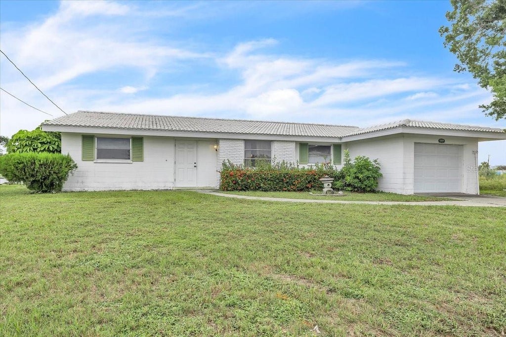 Photo of 3395 Pinetree Street, Port Charlotte, FL 33952 (MLS # C7529020)