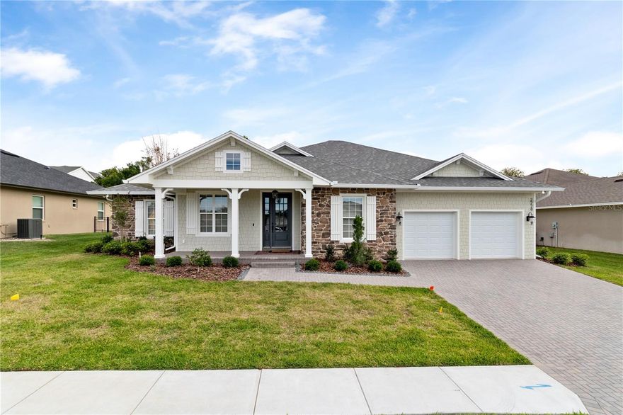 This home is a refined interpretation of the modern English cottage, where timeless character meets clean, understated elegance. A soft, layered interior is anchored by classic millwork and tailored cabinetry, complemented by a nuanced palette that feels both warm and restrained.

Ideally situated just a few miles from the Polk Parkway, the home offers a central location between Tampa and Orlando, with convenient access to the new Orlando Health hospital just down the road. Located within a highly regarded school zone, the community also features a year-round heated pool powered by natural gas. Thoughtfully designed with numerous ADA features, this home seamlessly blends charm, comfort, and accessibility.