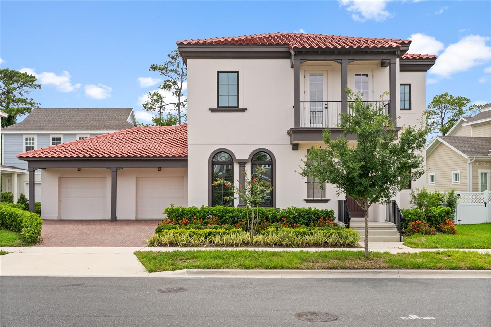 Welcome to this never-lived-in luxury residence in *Island Village at Celebration* the newest and most refined phase of the iconic community originally developed by The Walt Disney Company. Designed to blend timeless architecture with modern elegance, this home offers a lifestyle of nature, comfort, and convenience just minutes from Walt Disney World.
Located on a *premium lot with no rear neighbors* and backing onto a protected conservation area, the home features over 2,828 sq ft of living space, a spacious *3-car garage*, and elegant upgrades throughout. Step through the front door into a thoughtfully designed foyer that opens to a *flexible formal room*, ideal for a dining space or welcoming sitting area. This leads to a *butler’s pantry* and oversized walk-in pantry, perfect for entertaining.
At the heart of the home is a *gourmet kitchen* equipped with built-in appliance towers, quartz countertops, herringbone backsplash, and a large waterfall island. The kitchen flows seamlessly into the open-concept family room and *sunlit breakfast room*, offering beautiful views of the lush preserve beyond the backyard.
Upstairs, the primary suite offers a relaxing retreat with *dual walk-in closets* and a spa-inspired bath with double vanities, a large shower, and designer finishes. The *second en-suite bedroom* is perfect for guests or multigenerational living. Bedrooms 3 and 4 share a spacious Jack-and-Jill bathroom with dual vanities, and all rooms offer ample closet space. A well-appointed laundry room with utility sink and built-in cabinets adds convenience.
Other features include luxury vinyl plank flooring, zoned A/C with two high-efficiency *Carrier units*, upgraded lighting, and a *powder bath* downstairs for guests. The covered lanai overlooks backyard, offering space to build a future pool or outdoor entertainment area.
Island Village residents enjoy resort-style amenities, including pools, parks, playgrounds, scenic trails, and the brand-new Island Village Elementary School located right within the community. You’ll also be just minutes from Celebration Town Center, I-4, and world-class attractions.
This move-in-ready home is a rare opportunity to own in Celebration’s most exciting new village — combining modern design, privacy, and Florida charm in one of Central Florida’s most sought-after locations.