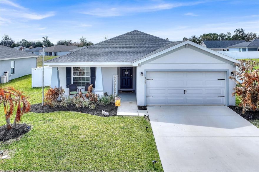 Beautifully maintained one-story home located in the desirable community of The Lakes II in Lake Alfred, offering 1,715 square feet of thoughtfully designed living space with 4 bedrooms, 2 bathrooms, and an open-concept layout perfect for both everyday living and entertaining.

The bright and functional floor plan creates a seamless connection between the kitchen, dining café, and gathering room, delivering a comfortable flow throughout the home. The open kitchen features 36" white shaker-style cabinetry, Samsung stainless steel appliances, a walk-in pantry, and a spacious island, all fully open to the main living area for effortless entertaining.

Luxury wood-look vinyl plank flooring enhances the living areas, laundry room, and bathrooms, while stain-resistant carpeting provides comfort in the bedrooms. The owner’s suite offers a private retreat complete with a generous walk-in wardrobe and an en-suite bath featuring dual vanities, a tiled shower, and a private water closet.

Step outside to enjoy the extended lanai and fully fenced backyard, providing privacy and the perfect space for outdoor gatherings, pets, or relaxing evenings at home. Additional highlights include a 2-car garage, custom-fit window blinds, architectural shingles, and energy-efficient insulation and windows for year-round comfort and efficiency.

Situated in a quiet residential neighborhood, this home offers convenient access to major highways for easy commuting to Orlando, Tampa, and throughout Central Florida. Enjoy close proximity to shopping, dining, parks, lakes, and local attractions while living in one of Lake Alfred’s most welcoming communities.