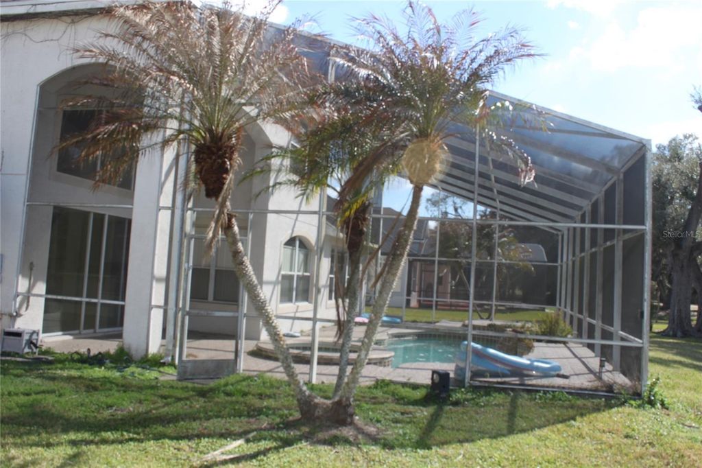 Photo of 1615 The Oaks Boulevard, Kissimmee, FL 34746 (MLS # O6391190)