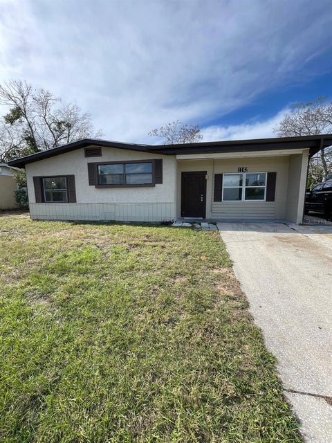 Photo of 1142 Berkshire Road, Daytona Beach, FL 32117 (MLS # O6437192)