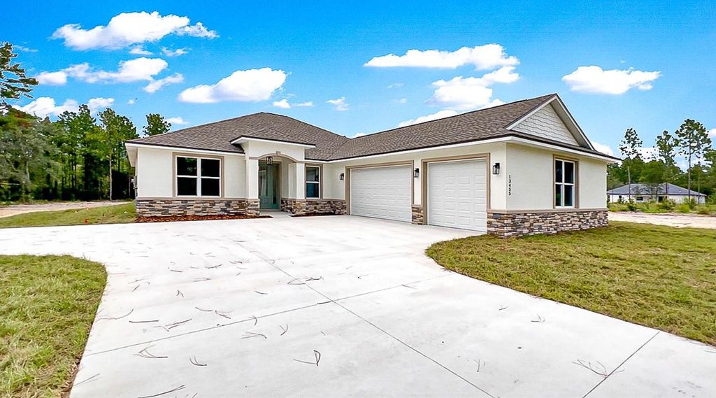 Photo of 8435 SW 130 Terrace, Dunnellon, FL 34432 (MLS # O6389876)