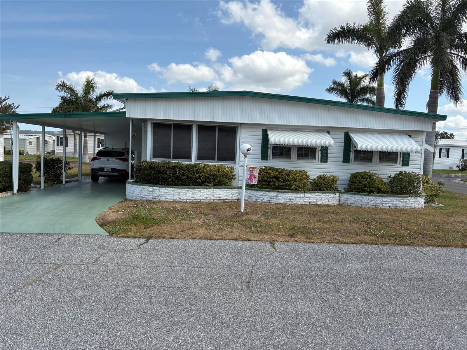 Remodel two bedroom two bath, nice corner lot, eat in kitchen, living room, dining room combo, large walk in closet, newly painted, land owner, water, sewer, trash, cable and internet included in HOA fee. Low HOA fee.