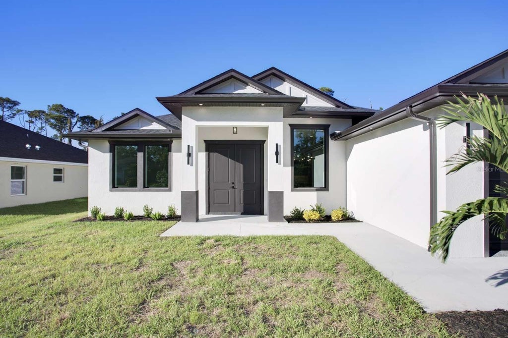 Photo of 5776 Shaffer Avenue, North Port, FL 34291 (MLS # TB8562683)