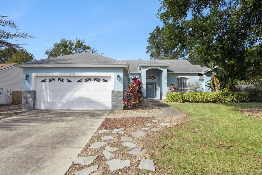 Welcome to this beautifully updated 3-bedroom, 2-bath home with an office, located in the gated and well-maintained Hills of Clermont community. This property offers a low HOA and convenient access to local businesses, along with a wide range of thoughtful improvements inside and out. The interior features luxury vinyl plank (LVP) flooring throughout, a custom front door, upgraded window and base moldings, and attractive shiplap accent walls in the great room, primary bedroom and 2nd bathroom. Fixtures and door hardware have been upgraded to brushed stainless finishes. The kitchen includes an upgraded sink, faucet, disposal, and countertops. The primary bathroom offers quartz countertops, updated sinks and faucets, a newer shower enclosure with tile and pebble flooring, a newer tub, and toilet. Likewise, the guest bathroom includes a newer vanity with drawers, a quartz countertop, updated fixtures, a newer soaker tub, new tile, and toilet. The backyard provides a welcoming outdoor setting with mature landscaping, hardscaping, a paver patio, custom planters, and a landscaping wall. A large paver area wired for electricity offers additional options for outdoor enjoyment or entertaining. Additional upgrades include a Trane 3.5-ton, 16 SEER A/C installed in 2016 (regularly maintained), a roof replaced in 2018, solar-powered roof vents with added ridge vents for improved efficiency, a new water heater installed in September 2025, and interior paint completed in 2022. This home offers a comfortable layout, practical updates, and inviting indoor and outdoor spaces within a quiet, gated community.