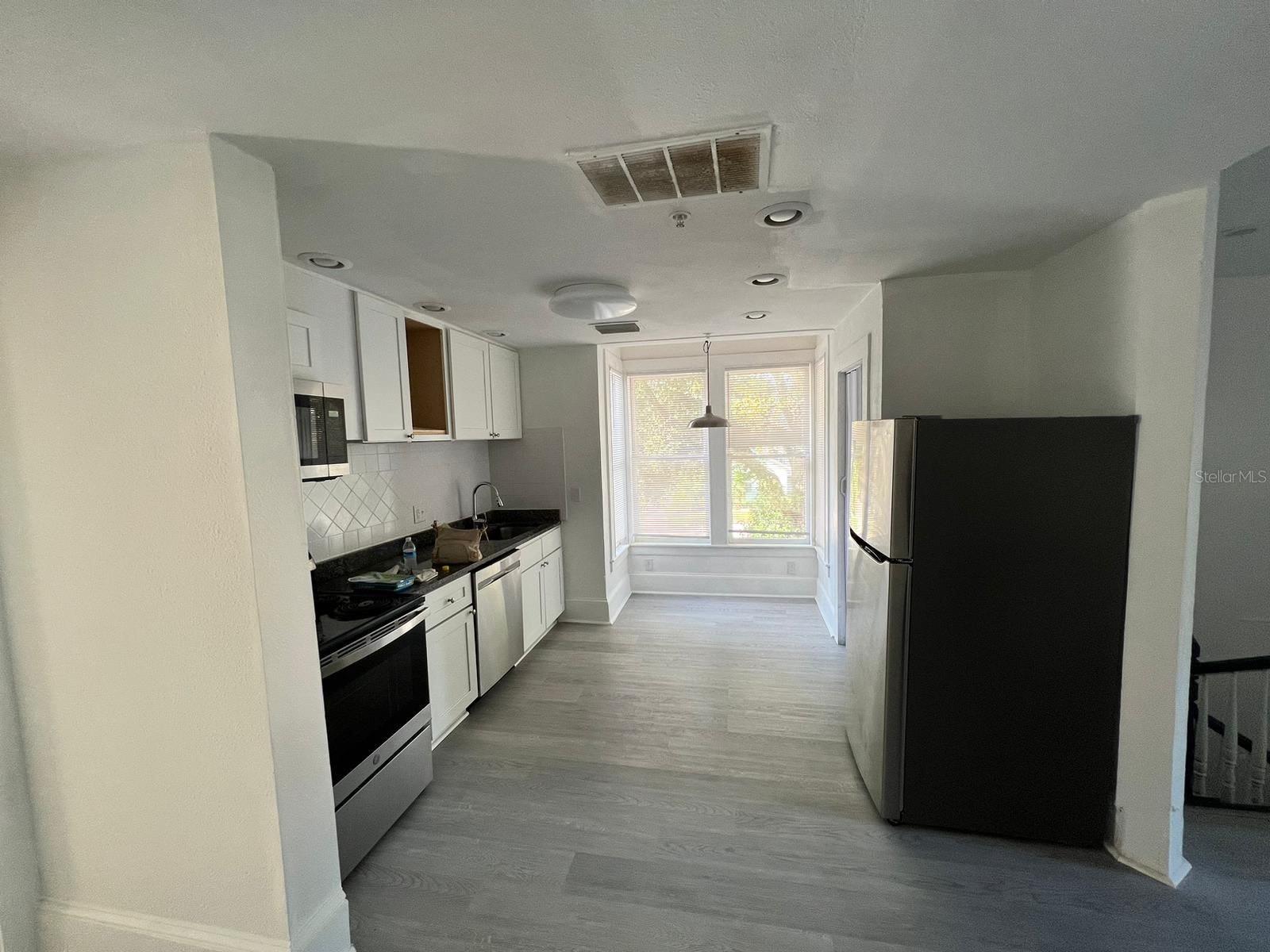 Welcome to your new home in the heart of Eustis! This beautifully renovated second-floor unit offers serene water views of Lake Eustis and modern upgrades throughout.
Step into a light-filled living space featuring brand-new flooring, a sleek kitchen with stainless steel appliances, quartz countertops, and contemporary finishes.
Located just minutes from downtown Eustis, local shops, restaurants, and the waterfront park, this home combines peaceful lakeside living with walkable amenities.