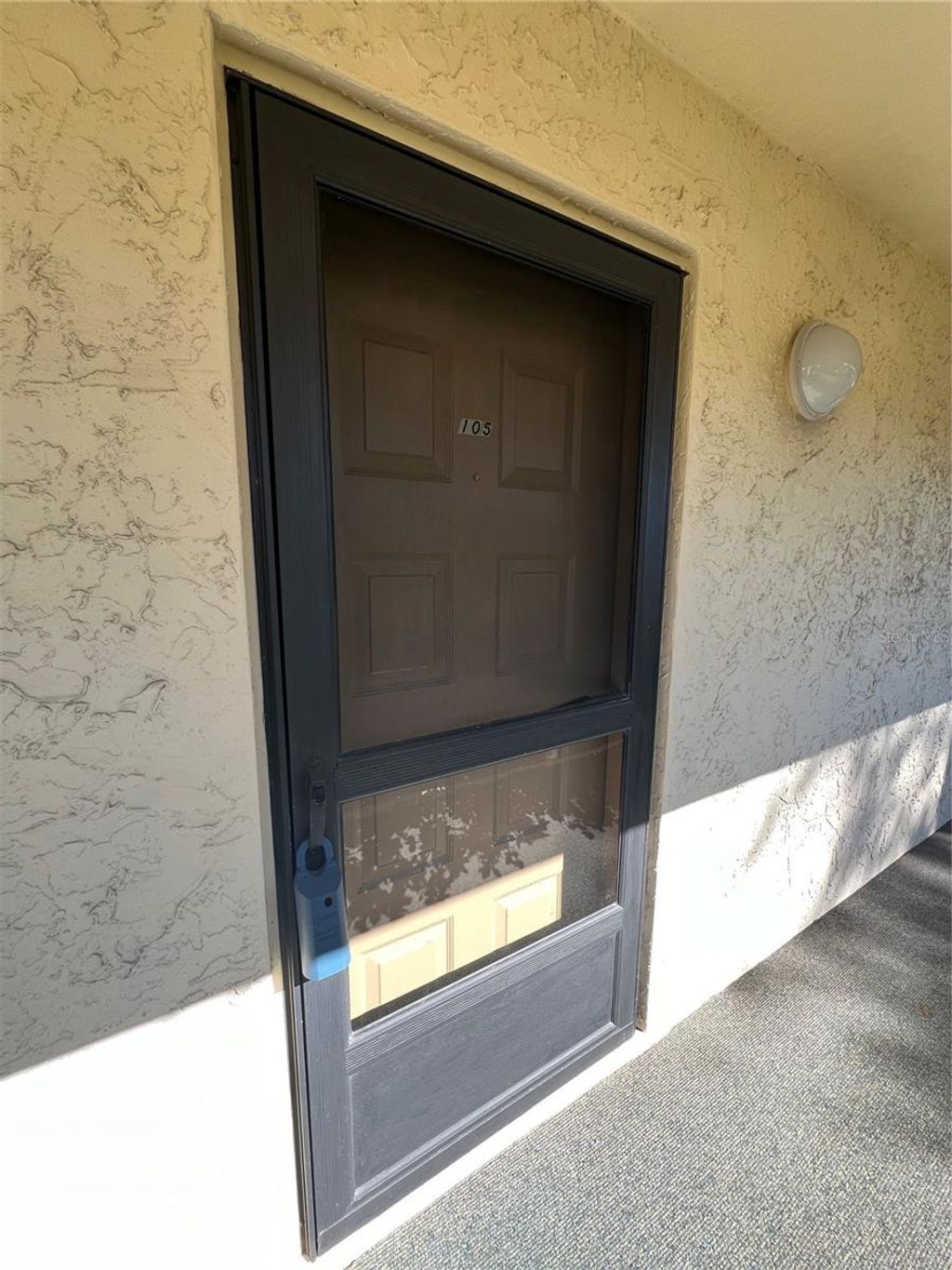 Photo of 11485 Oakhurst Road #A105, Largo, FL 33774 (MLS # TB8463379)