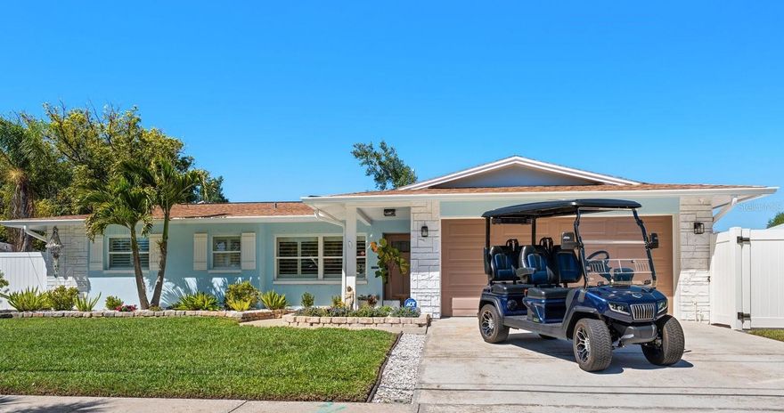 Location, Lifestyle and the Dunedin Vibe…Perfectly positioned in the highly sought-after coastal town of Dunedin and located in a non-flood zone, this exceptional pool residence captures the essence of refined Florida living. Situated on one of Dunedin’s charming brick-lined streets and approximately one mile from vibrant downtown, this home offers an unmatched blend of tranquility, walkability and coastal energy. Inside, a light-filled open-concept design is elevated by plantation shutters, wide-plank luxury vinyl flooring, complemented by newer interior doors and a curated selection of updated fixtures and finishes. Every detail has been thoughtfully enhanced to create a space that feels both sophisticated and inviting. The kitchen is beautifully appointed with custom cabinetry, quartz countertops and backsplash, breakfast bar and a sunlit dining area, perfectly designed for both everyday living and effortless entertaining. The primary suite is a serene retreat, featuring a remodeled spa-inspired bath and walk-in closet. A versatile third bedroom, currently styled as an office opens through elegant French doors, seamlessly connecting to the outdoor living space and enhancing the home’s indoor-outdoor flow. Step outside into your private resort-style oasis. A stunning saltwater pool (2021) with a sparkling PebbleTec finish with a screened enclosure, covered patio and expansive brick paver entertaining areas, creating the perfect setting for relaxed coastal living or hosting. With multiple access points to the outdoors, you can effortlessly embrace the Florida lifestyle from the comfort of your new home. The meticulously maintained yard is fully fenced with white vinyl and enhanced by LED landscape lighting, newer Hunter irrigation system, while a convenient double gate provides ideal access for boat or golf cart storage. Benefit from the close proximity to the Gulf of Mexico, the Pinellas Bike Trail, and Dunedin Blue Jays stadium, all within walking distance. This golf-cart-friendly community allows for a quick, scenic ride to the heart of downtown, where waterfront dining, boutique shopping, and coastal charm await. Rest easy knowing that flood insurance is not required. Additional peace of mind includes: New A/C (2025), Electrical Panel (2023), Rheem Water Heater (2023) and Water Softener (2024). And as a true nod to its location, the property features Dunedin’s signature orange, an iconic symbol of this beloved coastal town. This residence is pristine and ready for it’s new owner.