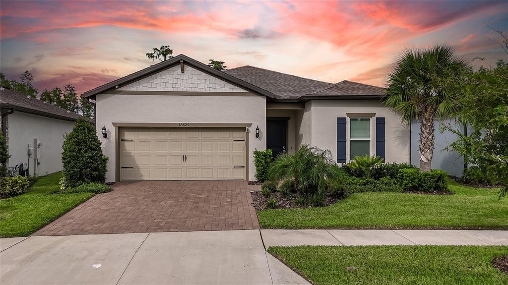 Photo of 18629 Coastal Shore Terrace, Land O Lakes, FL 34638 (MLS # TB8425979)