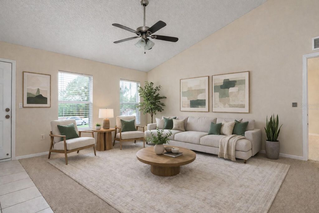 Photo of 647 Elwood Street, Deltona, FL 32725 (MLS # O6395899)