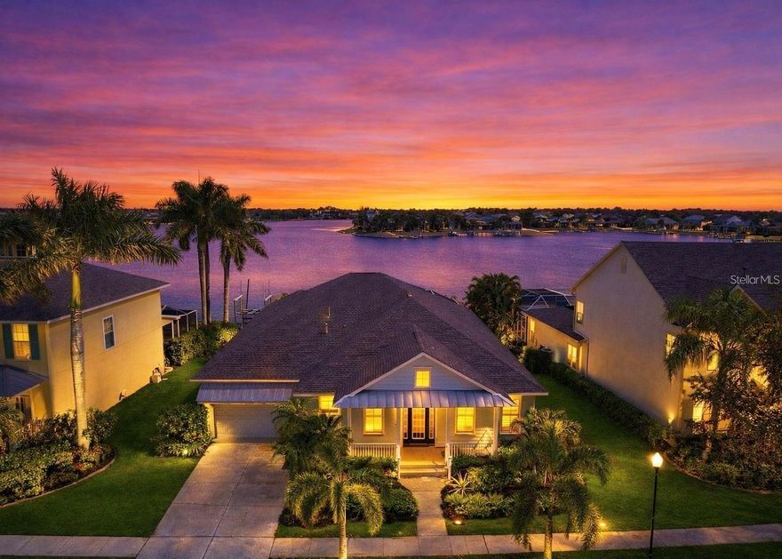 Experience Some of the Best Waterfront Views in MiraBay with Direct Access to Tampa Bay!
This stunning one-story Mangrove floor plan by David Weekley offers the perfect blend of luxury, comfort, and true Florida waterfront living. With approximately 3,000 square feet, this home features 4 bedrooms plus a versatile den/guest room/office, 3 full baths, a half bath, and a 2-car garage.
Step outside to your private backyard oasis where you’ll enjoy a resort-style pool and spa, paver deck, and outdoor kitchen, all overlooking the expansive lagoon. Boating enthusiasts will appreciate the private dock and 10,000 lb. boat lift, providing quick and easy access to Tampa Bay.
Inside, the home is filled with natural light thanks to walls of windows that showcase panoramic water views. The spacious kitchen is beautifully appointed with 42” cherry cabinetry, quartz countertops, stainless steel appliances, and ample workspace, making it perfect for entertaining. Additional features include plantation shutters, an expansive screened lanai, and a large backyard with a fire pit seating area.
The oversized owner’s suite is a true retreat, featuring bamboo flooring, a sitting area with water views, and a luxurious bathroom with an oversized walk-in shower and a rare 3-person sauna.
Additional highlights include:
Desirable open floor plan
Guest room/office with en suite half bath
Panoramic pool screen enclosure
Garage attic insulated and foiled for energy efficiency
Floored attic for additional storage
Newer roof, A/C, and water heater
Pool table included
Located in the highly sought-after MiraBay community, residents enjoy resort-style amenities including a heated pool with slide and lap lanes, fitness center, spa, café, tennis and pickleball courts, playgrounds, basketball courts, and gated access. Conveniently located near downtown Tampa, Gulf beaches, Bradenton, Sarasota, and major highways, this home truly offers the best of Florida living.
Don’t miss this opportunity to own one of the most breathtaking waterfront homes in MiraBay—where every day feels like a vacation.