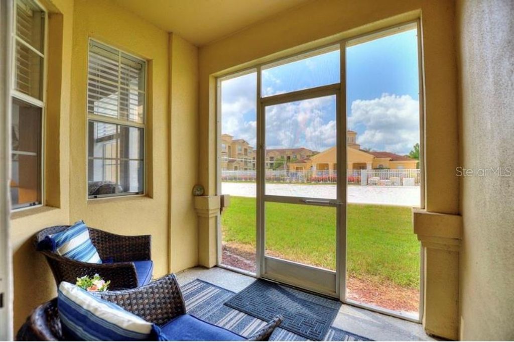 Photo of 504 Terrace Ridge Cir #311, Davenport, FL 33896 (MLS # S5129133)