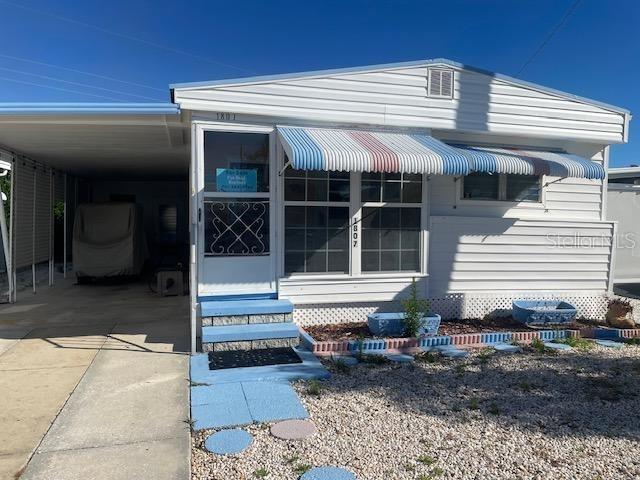 Light, Bright and Such a Delight! 2 bedrooms, 1 bath and offers an inside 10X09 storage room as well as the 08X06 enclosed front porch. This home is nicely turn-key furnished with a golf cart included in your purchase! The beautiful marina has available boat slips, an on-site boat master, and a pavilion to pack your lunch and enjoy a picnic on the bay. Some things you can participate in are swimming in the Olympic size pool with hot tub, gym, woodworking shop, bocce ball, pickle ball, horseshoes, pool and card table room, shuffleboard and its own community post office. Come to movie nights, holiday parties, potlucks and much more (all posted in the monthly newsletters Calendar of Events). Trailer Estates is located on Sara Bay and is centrally located to eateries, shopping, banking, hospitals, UTC Mall, Benderson Park, SRQ Airport, I-75 and best of all the beautiful beaches always rated among the top beaches in the U.S. Association says 55+ and rentals allowed. You own the lot and there are NO monthly fees....the $1338 HOA fee is paid through your Annual Property Taxes and includes...Cable T.V., Internet, On Site Manager, All Recreational Facilities, Escrow Reserves and Trash. Welcome Home to Trailer Estates!