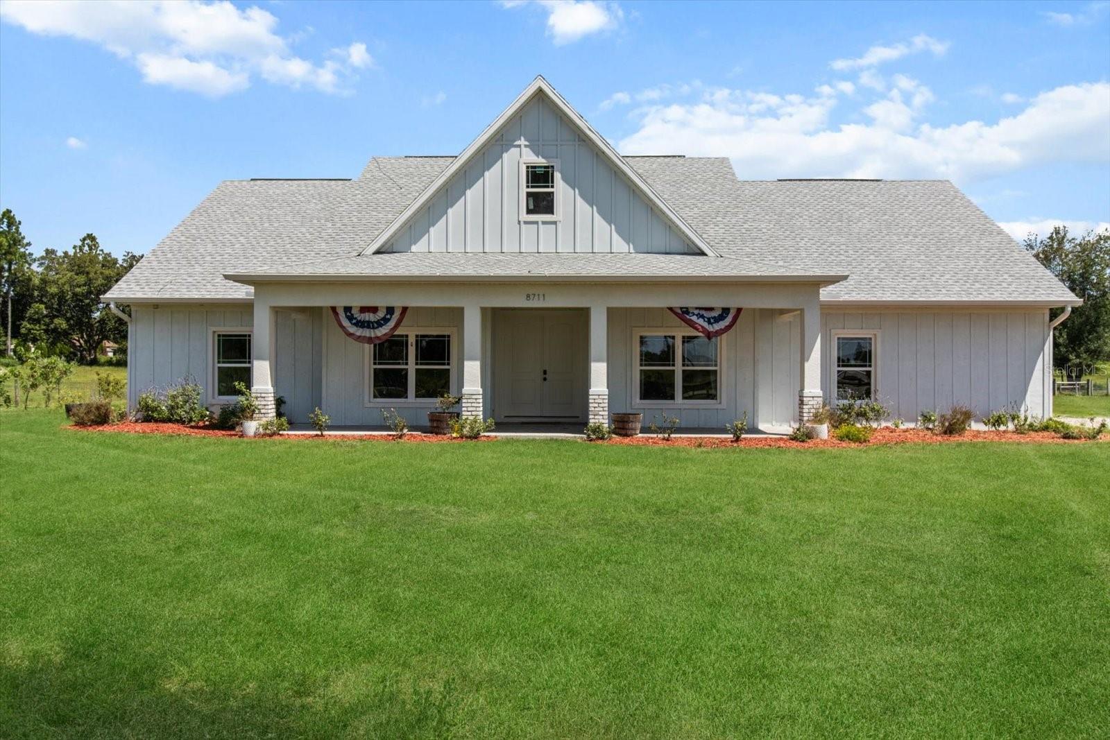 Welcome to your modern farmhouse retreat just outside Crystal River, set on nearly 10 acres of picturesque land! Built in 2022, this charming home features 3 bedrooms plus a versatile office, along with 2.5 stylish bathrooms. Inside, you'll find a harmonious blend of carpet and luxury vinyl plank flooring that adds both comfort and elegance. The heart of the home showcases stunning granite countertops paired with beautiful wood cabinets, creating an inviting space for cooking and gathering. The master bathroom is a luxurious haven, equipped with dual sinks, a spacious walk-in shower, and a classic clawfoot tub perfect for unwinding after a long day. Step outside to explore your expansive, fully fenced 10 acres, ideal for livestock or enjoying outdoor activities. With a dedicated livestock barn and ample space to add a pool, the possibilities are endless. You'll also appreciate the assorted fruit trees that enhance the property’s natural beauty. Located just minutes from the future expansion of the Suncoast Parkway and within an hour’s drive to Tampa, this modern farmhouse offers the perfect blend of rural tranquility and urban accessibility. Don’t miss your opportunity to make this stunning property your own!
