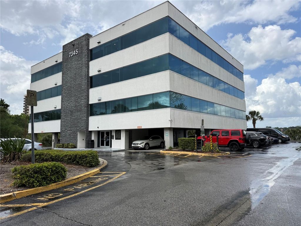 Photo of 7345 W Sand Lake Road #404, Orlando, FL 32819 (MLS # O6405147)