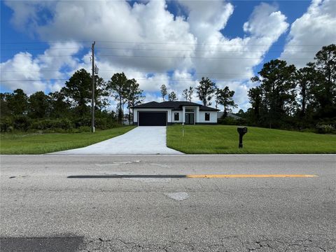 Photo of 3203 Sunshine Boulevard N, Lehigh Acres, FL 33971 (MLS # A4650598)