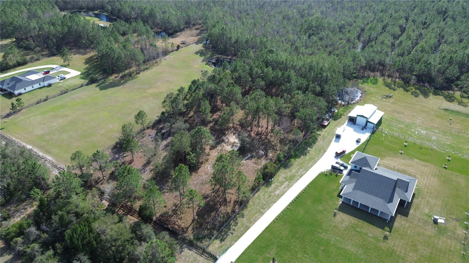 Imagine building your dream home, a multi-generational haven, and a thriving farm, all on one stunning property. This rare opportunity presents over 5 acres of vacant land, zoned for agricultural use, just minutes from the vibrant city of Palm Coast. Create the lifestyle you've always envisioned, where country living meets urban convenience. This is more than just a piece of land; it's an investment in your future. Don't miss this chance to create the life you've always wanted. Bore test results and Blueprints on file. Contact us today to learn more and schedule a private showing!