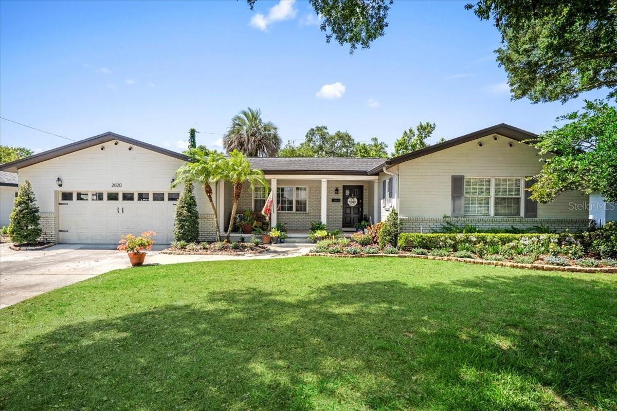 One or more photo(s) has been virtually staged. Welcome to 2020 Geronimo Trail—an inviting 3-bedroom, 2.5-bath mid-century ranch-style pool home nestled in one of Maitland’s most beloved neighborhoods. Built in 1961, this home has been lovingly cared for by just three owners in its entire lifetime—a true testament to pride of ownership. Set on a .22-acre lot with mature trees and a spacious backyard, the home is ideally located just blocks from A-rated Dommerich Elementary and Maitland Middle, and zoned for Winter Park High School. A covered front porch welcomes you with classic charm, perfect for morning coffee or evening conversations in rocking chairs. Inside, you’ll find original hardwood floors, a bright living room with wainscoting, a dining room with French doors that open to the backyard, and an eat-in kitchen featuring solid wood Amish cabinetry—handcrafted in Indiana with extra-deep storage. A spacious laundry room with a half bath and backyard access makes for an ideal pool bath setup. The oversized garage offers high ceilings and attic storage, adding everyday functionality. The primary suite includes dual closets and an ensuite bath, while two additional bedrooms and a full hallway bath complete the thoughtfully designed floor plan. Additional features include multiple storage closets, a sparkling swimming pool, and a host of recent upgrades: new electrical panel, new plumbing, upgraded AC duct insulation, and a newer HVAC system. Located just minutes from the shops, dining, and cultural scene of downtown Winter Park, this home blends timeless architecture with modern comforts in a location that continues to grow in value and desirability. Don’t miss this rare opportunity to own a piece of Maitland history on a great street. Schedule your showing today!