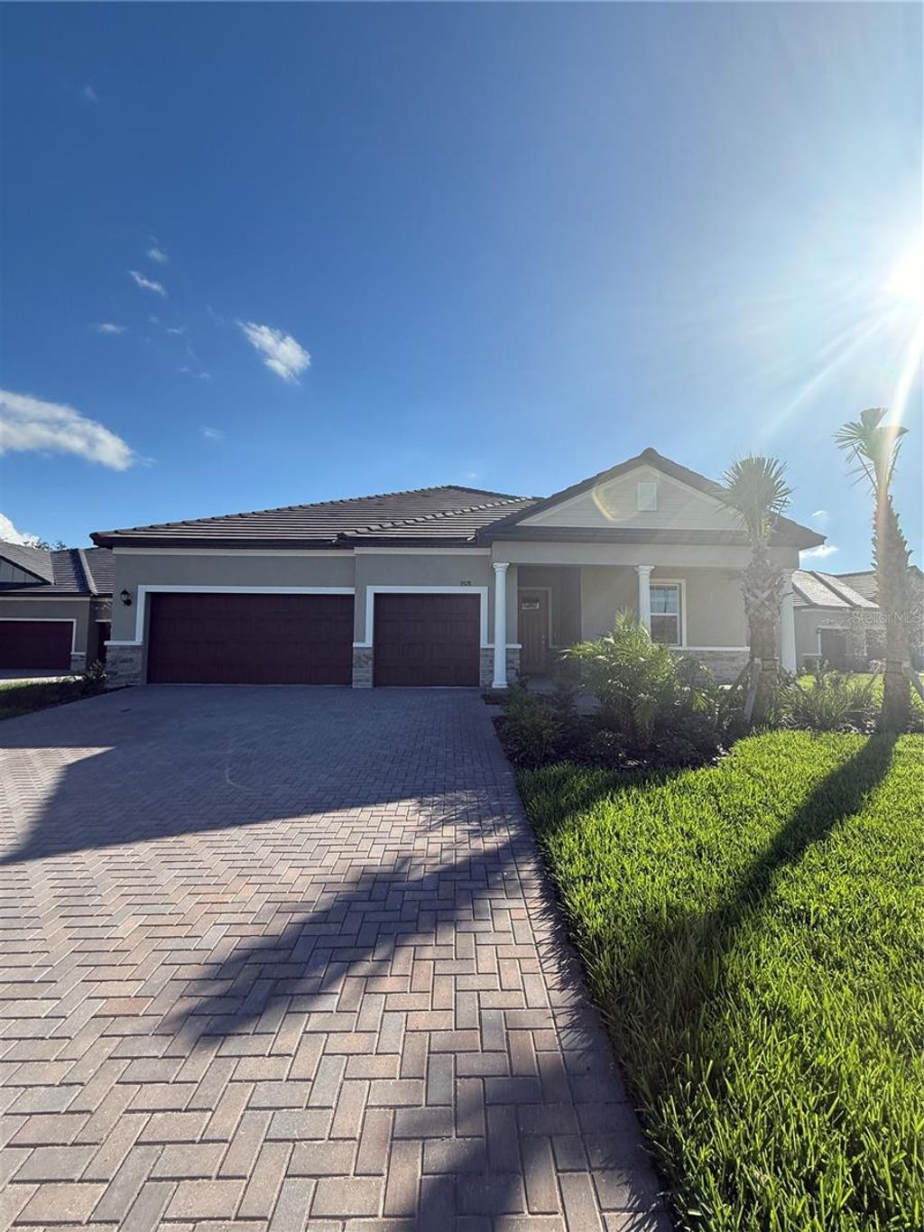 Photo of 9328 Minnow Ray Dr, Land O Lakes, FL 34638 (MLS # J994417)