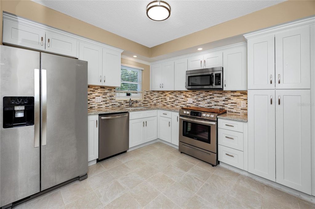 Photo of 2440 World Parkway Boulevard #38, Clearwater, FL 33763 (MLS # TB8475430)