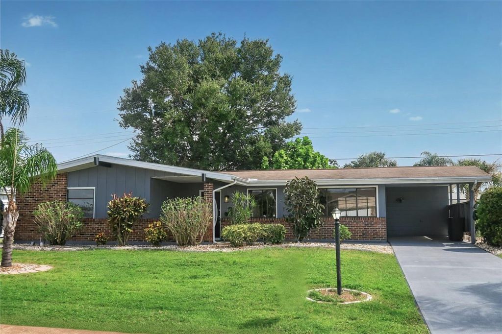 Photo of 806 Oakmont Avenue, Sun City Center, FL 33573 (MLS # TB8433158)