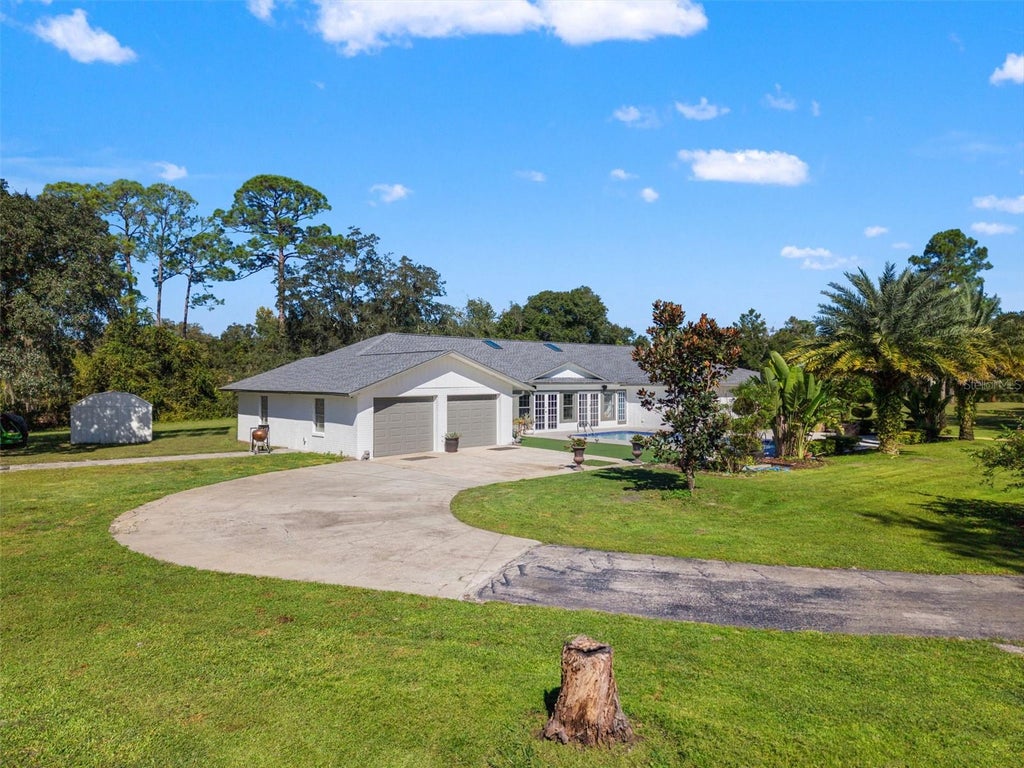 Photo of 1 Cunningham Lane, Debary, FL 32713 (MLS # O6447079)