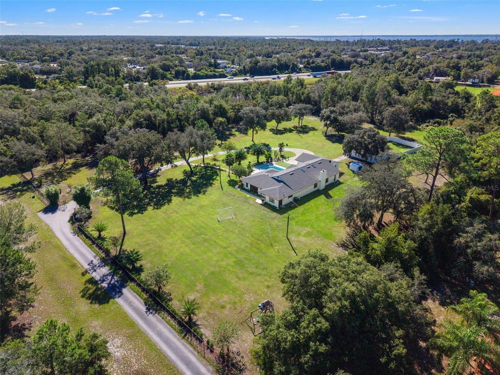 Photo of 1 Cunningham Lane, Debary, FL 32713 (MLS # O6447079)