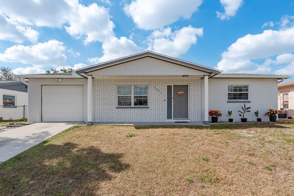 Photo of 9829 Crofton Lane, Port Richey, FL 34668 (MLS # TB8447044)