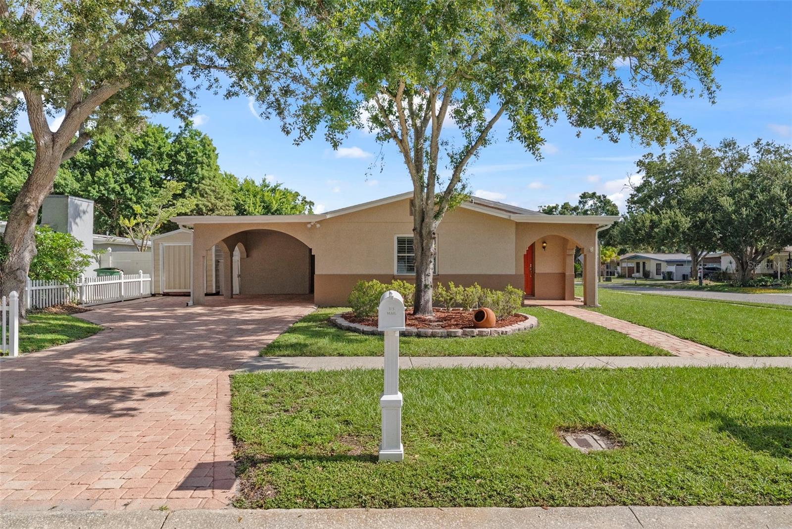 Fully Remodeled 3 bedroom, 2 bath Bungalow is located on a tree lined corner lot in South Tampa. New Owners will have the perfect opportunity to enjoy all of the improvements this home has to offer, including the wonderful backyard Pool, and entertaining space. Upon entering the home you will find a fully remodeled kitchen with granite countertops and space for a living room/dining room combo. The split floorplan is perfect with the primary bedroom including an ensuite bath. The many improvements in this home include wood grain
look tile floors throughout the home, painting with crown molding, ceiling fans, newer roof, new AC, ductwork and insulation, newer appliances including washer and dryer, refinished inground pool, new pump with Hayward salt system. The pool is heated with newer solar panels. The pool and covered lanai are surrounded with pavers throughout. This area was made for rest and relaxation as well as backyard entertaining. Don't miss out on seeing this South Tampa gem.