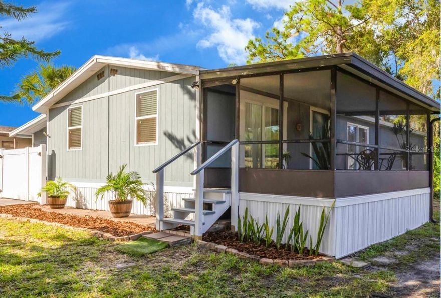 Warm and inviting, this beautifully remodeled three-bedroom, two-bath, move-in-ready home combines comfort, style, and functionality in this cul-de-sac community, where you own the land and there’s no HOA! 

Step inside to an open-concept split floor plan enhanced by vaulted ceilings creating an airy, modern feel. The updated kitchen features solid wood cabinetry, granite countertops, stainless-steel appliances, and a spacious island on wheels for those days you’d like a change of Floorplan or hosting space, with bar seating and an eat-in dining area, perfect for entertaining or everyday living. Each bedroom offers generous space, vaulted ceilings, and walk-in closets, while the primary suite provides a private, relaxing retreat filled with natural light.

Enjoy peace of mind knowing this home has never experienced interior flooding and includes major updates within the past three years, such as new flooring, double-pane energy-efficient windows, a new roof, new HVAC system, new ductwork beneath the home, and a new water heater, ensuring comfort and efficiency for years to come. 

An enclosed, insulated, and air-conditioned 576-square-foot carport creates the perfect flex space, ideal for a workshop, hobby room, climate-controlled studio, or storage for a motorcycle, golf cart, or ATV. 

Outside, you’ll find double driveways and a large grassy lot with plenty of room to park a boat or RV, surrounded by mature landscaping that adds privacy and curb appeal. The back of the lot is wooded with no rear neighbors, offering privacy.
Unwind and take in peaceful sunrises from your screened-in porch, or explore nearby beaches, the river, shopping, and dining all just minutes away. 

This is affordable coastal Florida living at its finest, a rare find offering both modern updates and a low-maintenance lifestyle.