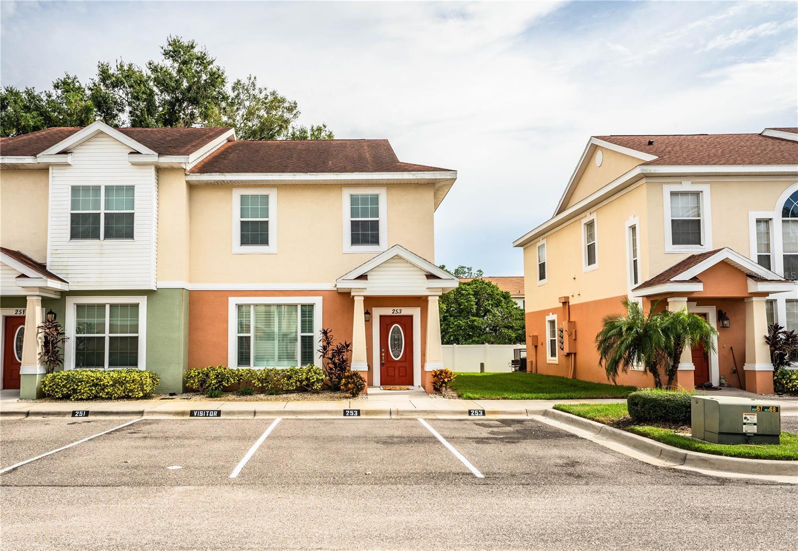 Welcome Home to Alexander Woods! Step into this move-in-ready 3-bedroom, 2.5-bathroom townhome located in the desirable gated community of Alexander Woods, which is conveniently situated across from Plant City High School with easy access to everything Plant City has to offer. As you enter, you're welcomed by a spacious living room featuring ceramic tile flooring, elegant crown molding, and plantation shutters that add a touch of charm and privacy. The well-appointed kitchen is a chef’s dream, boasting all appliances, tile backsplash and ceramic tile flooring, a cozy dining nook with space for a small table, an oversized walk-in pantry with built-in shelving and under-stair storage, built-in desk area with cabinets, additional closet pantry, ample counter space and upgraded cabinetry, and the laundry closet with shelving and extra storage. From the kitchen, sliding glass doors lead to a covered patio, which is perfect for outdoor seating, and with a convenient storage room attached. Upstairs, you’ll find all three bedrooms, including the spacious primary suite featuring dual walk-in closets, crown molding, and an en-suite bathroom with a large, tiled walk-in shower. The two additional bedrooms share a full bathroom with a tub/shower combination. A versatile loft area offers space for a desk or reading nook. A half bathroom is located downstairs for added convenience. Community amenities include a swimming pool, clubhouse, and a playground, which is ideal for families and entertaining guests. Additional highlights of this home include: Newer water heater, double-pane windows, updated lighting and ceiling fans, Smart thermostat, and much more! This home is clean, well-maintained, and ready for its new owners. Don’t miss this opportunity and schedule your showing today!