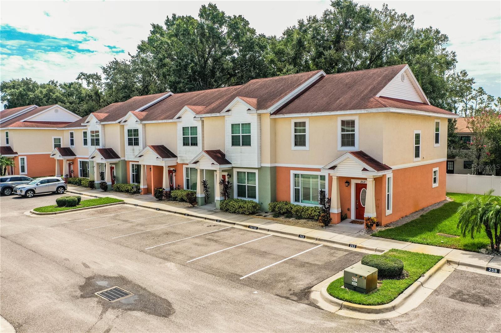 Welcome Home to Alexander Woods! Step into this move-in-ready 3-bedroom, 2.5-bathroom townhome located in the desirable gated community of Alexander Woods, which is conveniently situated across from Plant City High School with easy access to everything Plant City has to offer. As you enter, you're welcomed by a spacious living room featuring ceramic tile flooring, elegant crown molding, and plantation shutters that add a touch of charm and privacy. The well-appointed kitchen is a chef’s dream, boasting all appliances, tile backsplash and ceramic tile flooring, a cozy dining nook with space for a small table, an oversized walk-in pantry with built-in shelving and under-stair storage, built-in desk area with cabinets, additional closet pantry, ample counter space and upgraded cabinetry, and the laundry closet with shelving and extra storage. From the kitchen, sliding glass doors lead to a covered patio, which is perfect for outdoor seating, and with a convenient storage room attached. Upstairs, you’ll find all three bedrooms, including the spacious primary suite featuring dual walk-in closets, crown molding, and an en-suite bathroom with a large, tiled walk-in shower. The two additional bedrooms share a full bathroom with a tub/shower combination. A versatile loft area offers space for a desk or reading nook. A half bathroom is located downstairs for added convenience. Community amenities include a swimming pool, clubhouse, and a playground, which is ideal for families and entertaining guests. Additional highlights of this home include: Newer water heater, double-pane windows, updated lighting and ceiling fans, Smart thermostat, and much more! This home is clean, well-maintained, and ready for its new owners. Don’t miss this opportunity and schedule your showing today!
