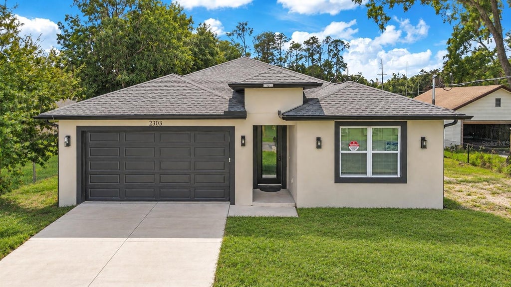 Photo of 2203 W Lowry Avenue, Plant City, FL 33563 (MLS # L4965859)
