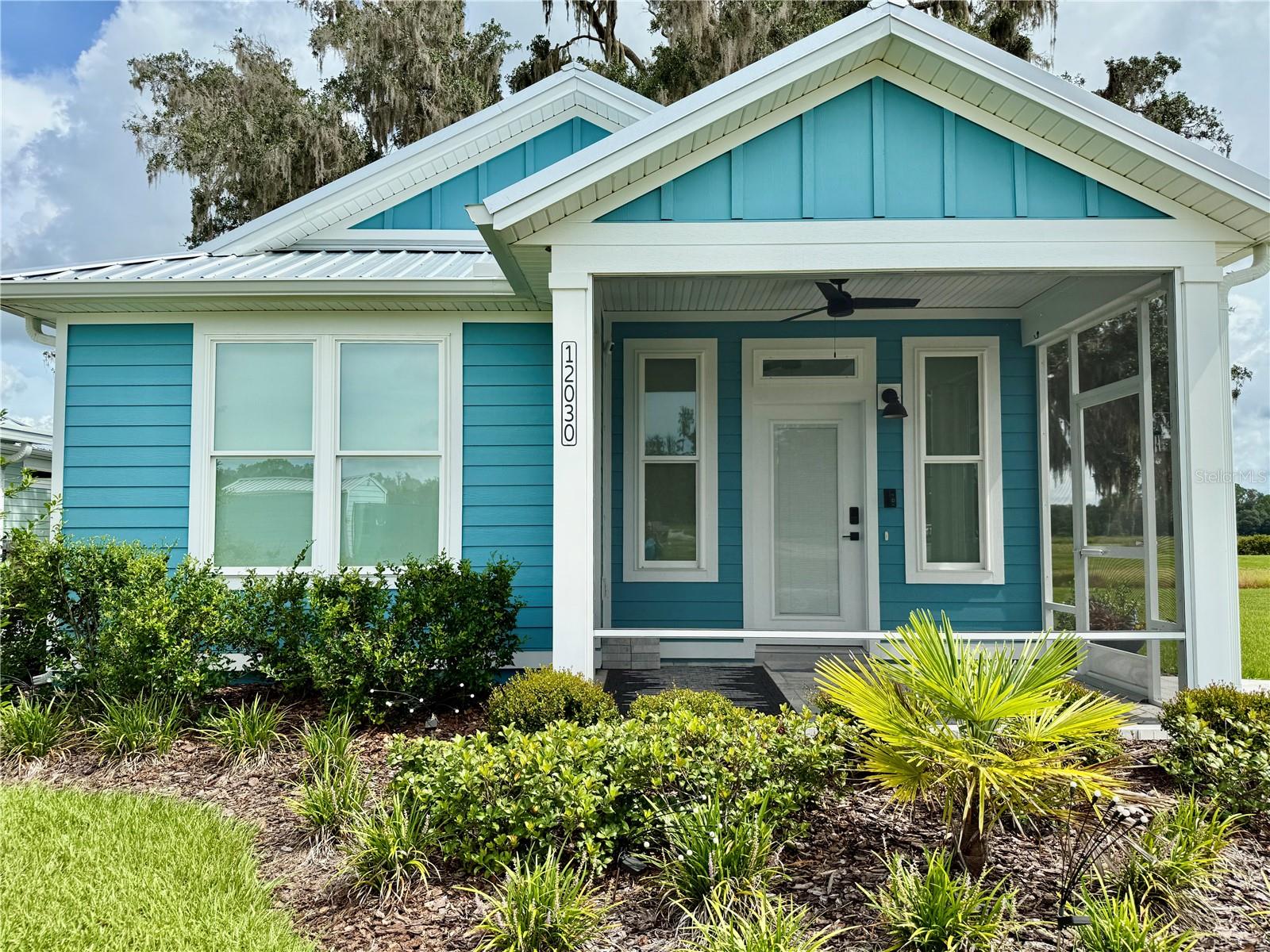 Welcome to your peaceful retreat near The Villages! This charming 2 bed, 2 bath home sits on a rare double lot with scenic views of Lake Andrew. Enjoy a bright, open-concept kitchen, living, and dining area, plus enclosed front and rear porches—perfect for relaxing or entertaining. Located in a unique land-leased cottage home community packed with amenities: clubhouse, pool, fitness center, dog park, walking paths, sunset fire pit, and more. Monthly fees cover cable/internet, water/sewer/trash, land lease, and full access to all community features. Come experience easy living in a vibrant, friendly neighborhood!