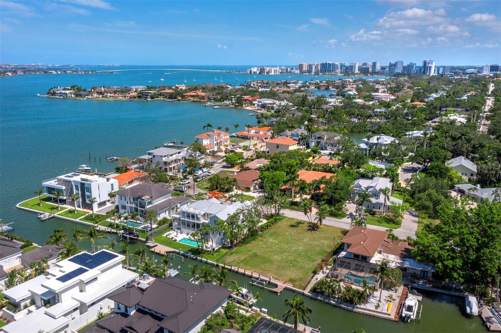 SELLERS WILLING TO CONSIDER ALL REASONABLE OFFERS... Absolutely the best mainland waterfront value, PLUS it's located West of Trail in PRIME McClellan Park/Southside Village area. 95 feet of canal frontage 3 lots in from Sarasota Bay on 0.32 acre lot. Newer seawall and dock plus 16,000 lb boat lift. Cleared and ready for you to build your dream home. GEO and Environmental report available for you as well as architectural renderings and elevations from renowned Architect Don Cooper. You can't beat the location, this is a great neighborhood with an easy stroll to Southside Village popular restaurants and shops. PLUS great school district