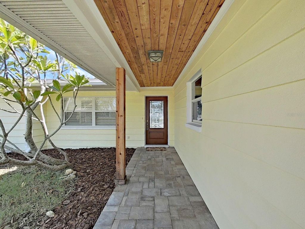 Photo of 11876 Walker Avenue, Seminole, FL 33772 (MLS # TB8437278)