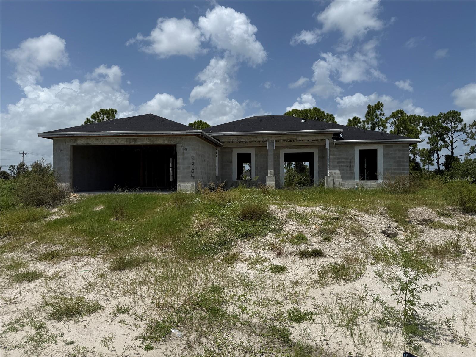 Seize this rare opportunity to secure this mid-construction 4 BEDROOM 3 BATHROOM 2 CAR GARAGE HOME WITH DIRECT CANAL FRONTAGE.
These properties offer tremendous value for investors, builders, or buyers looking to complete a project and make this home their own. Designed with an open-concept layout, this home includes a spacious kitchen with a center island and huge vaulted ceilings, a private primary suite with an en-suite bath and walk-in closet, and three full bathrooms—ideal for families or guests. The split-bedroom floor plan allows for privacy and functionality, while the covered lanai offers peaceful waterfront views and space to relax or entertain. Situated on freshwater canals, these homes provide access to kayaking, fishing, and serene sunset views right from your backyard. With major construction elements already underway, these homes present a valuable opportunity to finish with your own design touches or resell at completion! ALSO BEING SOLD - 1017 NE 44TH STREET, CAPE CORAL, FL. CALL TODAY FOR MORE DETAILS!