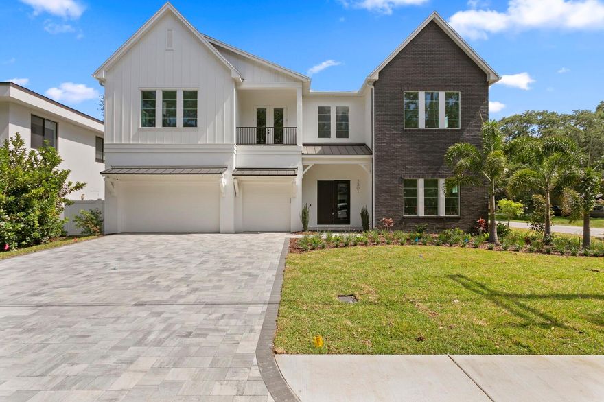 MOVE IN READY!  This Modern Farmhouse (6 beds,6.5 baths,5957sf) pool home by the coveted Adobe Homes features custom details, unlike any other home on the market. Spacious open floor plan with 12' Ceilings on the first floor and 10' Ceilings on 2nd floor. Downstairs features a study, elegant wine room, built-in elevator shaft, mud room, butler's pantry, wine room, secluded guest suite, and pool bath. Wide plank wood flooring throughout all the living spaces. The Kitchen has Wolf/Subzero appliances, a Wine fridge, and Quartz countertops with a double island with one island including a waterfall edge. Step out to the pool from your paved lanai. Lavish landscaping throughout the front and backyard with irrigation. Luxurious spa-like master retreat with a ‘Wet Room” (glass-encased room with shower and tub) and a large walk-in closet. All of the other bedrooms feature en suites. Impact windows and smooth drywall throughout. Vinyl fencing. Epoxy floors in the three-car garage. Pre-wired for audio throughout and cameras. Smart features and security package. 1-year home warranty. Plant High district.