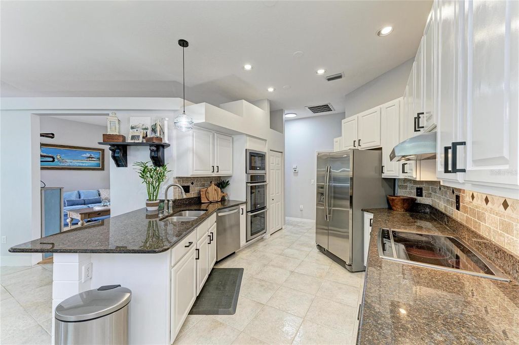 Photo of 411 75th Street NW, Bradenton, FL 34209 (MLS # A4678331)